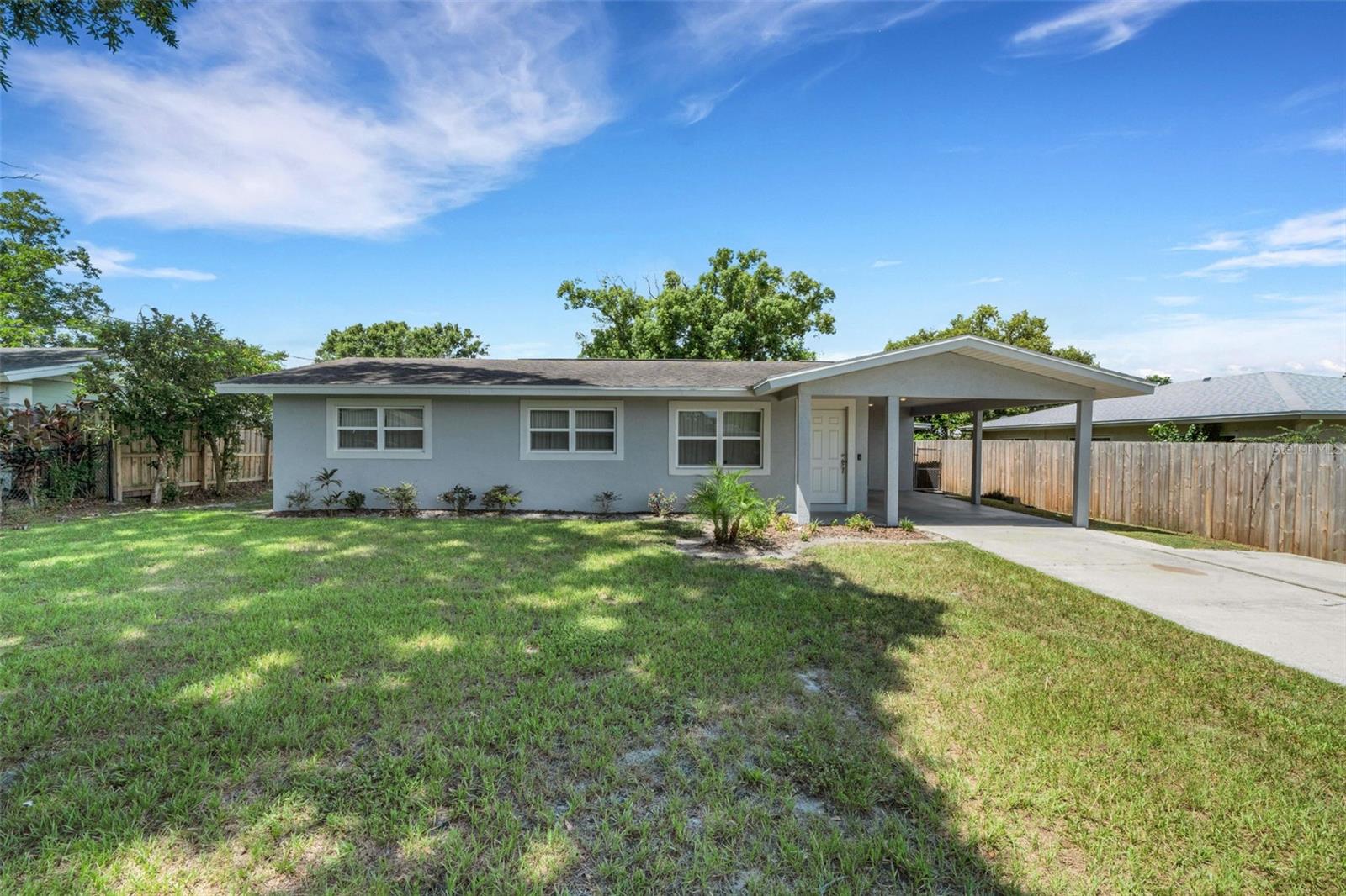 Welcome to this beautifully renovated 3-bedroom, 2-bath home in a quiet, centrally located neighborhood. Inside, you’ll find modern finishes throughout, including shaker-style soft-close kitchen cabinets, granite countertops, and stainless-steel appliances (only 2 years old). Both bathrooms are upgraded with tile showers that have rainforest showerheads. The bonus room is a cozy retreat, featuring large, beautiful windows looking out on your fully fenced backyard ready for year-round activities. Also, there is an enclosed patio that extends into a covered patio perfect for backyard grilling and games. This well-maintained home has double-pane windows, a professionally sealed exterior to deter pests year-round, and a new smart thermostat to go with the newer AC unit for efficient climate control.
Sitting on nearly a quarter-acre lot, this home is located near Lake Jessie, local shops, and schools. With no HOA restrictions and extensive upgrades throughout, this is a move-in-ready gem you won’t want to miss!