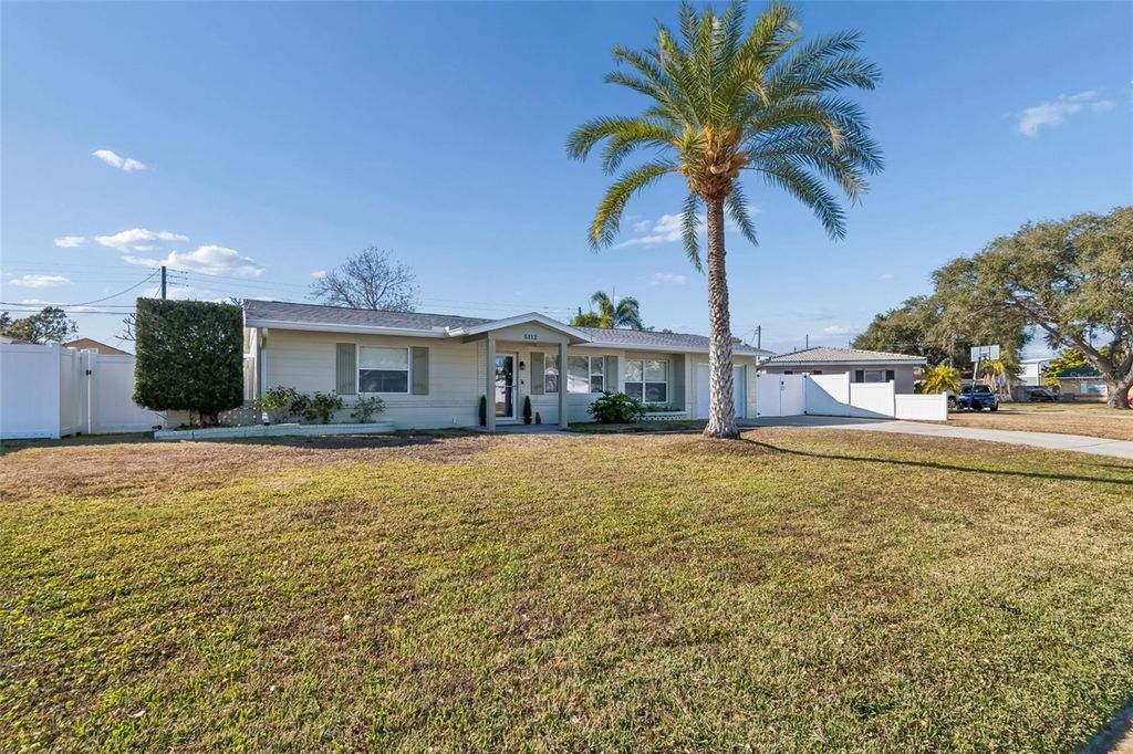 Photo of 5112 58th Way N, Kenneth City, FL 33709 (MLS # TB8473170)