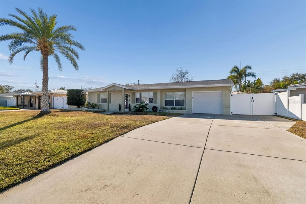 Photo of 5112 58th Way N, Kenneth City, FL 33709 (MLS # TB8473170)