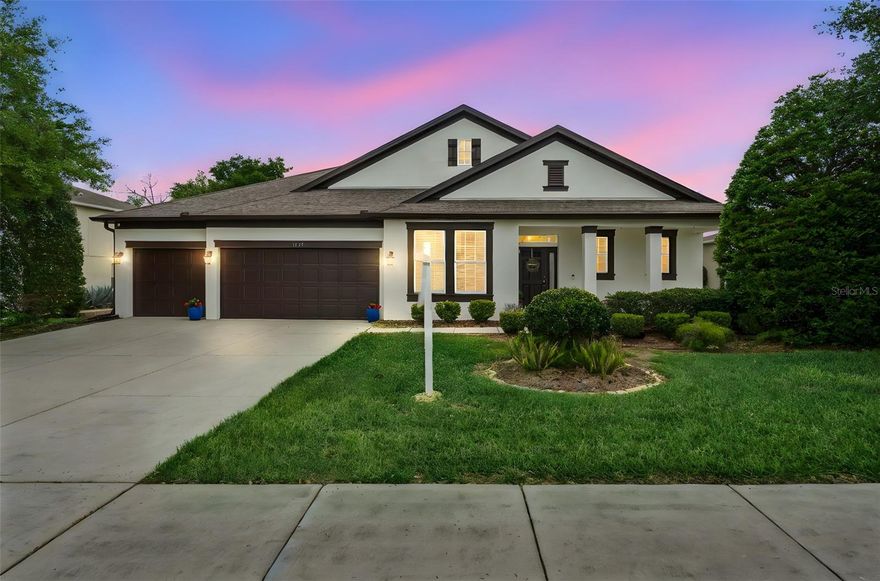 Welcome to this breathtaking executive residence located in the highly sought after Rock Springs Ridge community. This beautifully maintained home offers 4 spacious bedrooms, 3 full baths, and an oversized 3 car garage, providing the perfect blend of luxury, comfort, and functionality.Open Concept Living at Its FinestStep inside to an inviting open layout designed for both everyday living and effortless entertaining. The chef in the family will fall in love with the gorgeous gourmet kitchen, featuring: A massive granite island ideal for family gatherings Kitchen also features  Stainless steel appliances and a  Subway tile backsplash A convenient butler’s pantry Abundant cabinetry and prep space Perfect for Entertaining The expansive living area flows seamlessly to the large covered lanai, where you can relax and enjoy serene views of the wide open conservation area—no rear neighbors, just peaceful natural beauty. Beautiful Interior Features Wood look laminate flooring throughout the main living spaces High ceilings and abundant natural light Thoughtful split bedroom layout Luxurious Owner’s Retreat The spacious owner’s suite offers a true retreat, complete with: A generously sized bedroom Dual vanities A relaxing garden tub A large walk in shower A custom California Closet system  Ideal for Families or Guests Bedrooms 2 and 3 are both well sized and connected by a Jack and Jill bathroom, while the fourth bedroom and third full bath provide additional flexibility for guests or a home office. This home is move in ready and truly has it all. Contact me today to schedule your private showing.