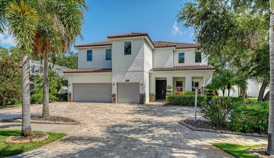 Located in one of Sarasota's most desired neighborhoods, "West of the Trail" in Red Rock Park, this fabulous family home boasts 5 spacious bedrooms and 4- and one-half baths, an executive style office, gym attached to the primary, and upstairs bonus room! The oversized lot and huge fenced-in back yard make a perfect setting for families and pets and the huge lanai, salt-water pool and outdoor entertaining space make entertaining a breeze. For your peace of mind during storm season this home is well equipped with PGT HURRICANE IMPACT WINDOWS AND SLIDING GLASS DOORS and a GENERAC GENERATOR! No damage was sustained during recent storms! Premium finishes throughout include a perfectly designed primary suite with dual walk-in closets, luxurious and spacious bath and ensuite exercise room. The main baths in the home feature programmable, heated and automated toilets with bidets for that special touch. One ensuite guest room downstairs and 2 additional ensuite bedrooms upstairs make this the perfect family layout. The custom office downstairs features premium cabinetry with tons of storage a beautiful granite desk. The spacious kitchen provides abundant cabinet storage, extra counter space and beautiful views to the lanai, pool and back yard. This home also includes a smart-home security system, new AC units in 2023 and 2022, Culligan water softening system, and tankless water heater.
This home also is a great investor option with plenty of room for a larger family, amazing features and finishes, great proximity to everything Sarasota has to offer, and flexible lease terms based on Sarasota County guidelines.
Just a bike ride away from A-rated schools, the Field Club and Oyster Bay, plus the fabulous shops and restaurants of Southside Village. It's also just moments away from the world-renowned crystal sand beaches of Siesta Key and Lido Key and amazing dining and cultural options in downtown Sarasota.