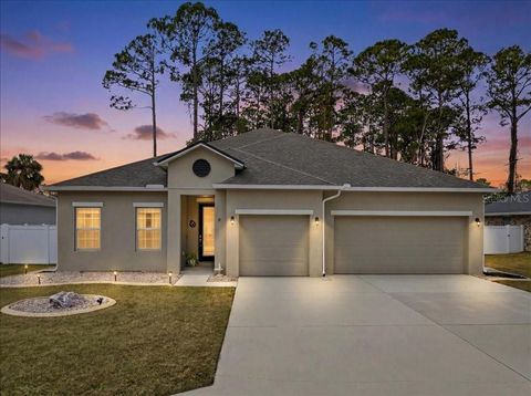 Photo of 41 Boulder Rock Dr, Palm Coast, FL 32137 (MLS # FC316322)