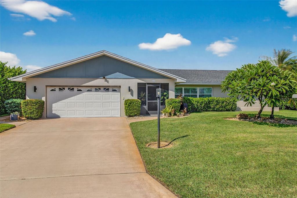 Photo of 227 S Lake Drive, Lehigh Acres, FL 33936 (MLS # TB8434932)