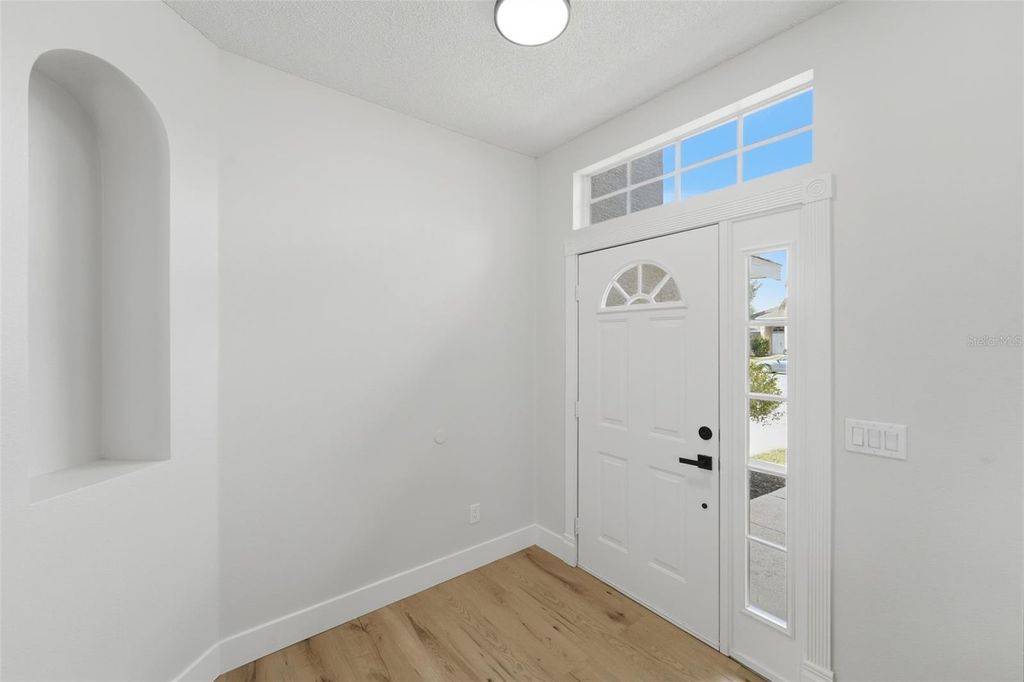 Photo of 1026 Raining Meadows Lane, Orlando, FL 32824 (MLS # O6398983)