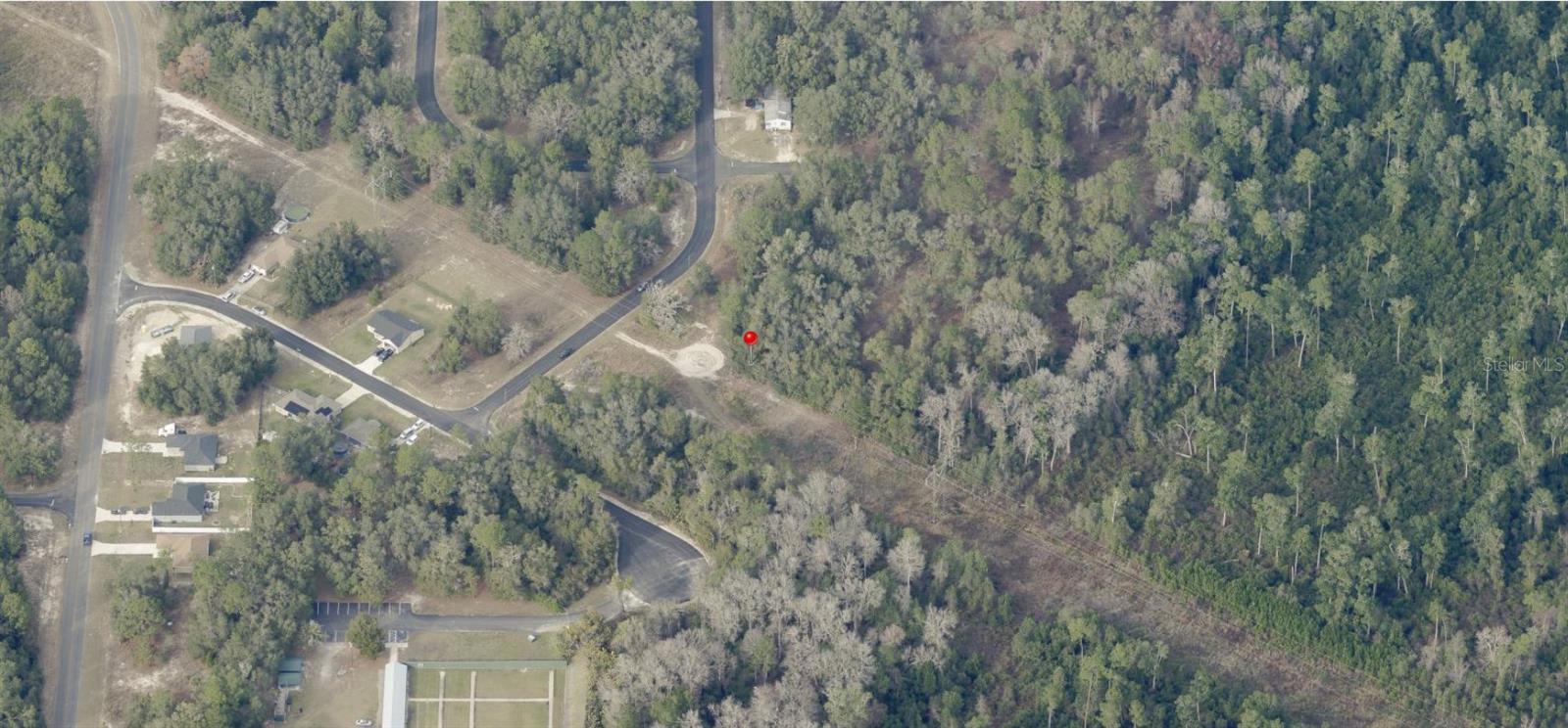 Discover the perfect opportunity to own nearly 0.88 acres of vacant land in the growing Silver Springs Shores community. Nestled in a quiet, residential area with paved road access and no HOA, you’ll enjoy the peace of country-style living just minutes from Ocala’s shops, restaurants, and schools. Whether you're ready to build now or invest for the future, this lot is priced to sell and offers fantastic potential. Don’t miss this rare opportunity to own a large lot in one of Marion County’s most desirable up-and-coming areas. For directional purposes please use 7 LOCUST TRAK.