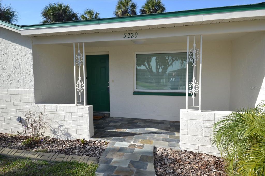 Photo of 5229 Miller Bayou Drive, Port Richey, FL 34668 (MLS # TB8464182)