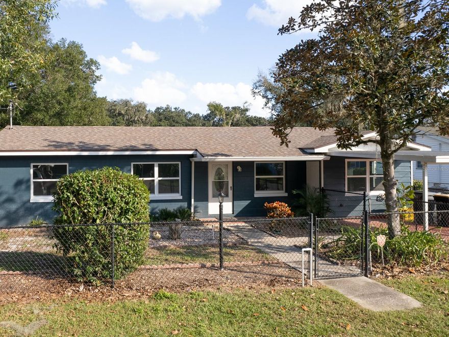 Totally updated! The entire home has been rewired and has new double-pane windows, new septic, new laminate flooring, and a new roof, all in 2023!  This 3 bedroom, 2 bath home is in a well maintained neighborhood just off of Lyle Parkway. One of the bedrooms can be used as a master suite or a separate mother in law suite, it has an adjoining bathroom and a private entrance just off of the carport. The large master suite has an adjoining bathroom. There is space in the master bedroom for a small office. There is an inside washer and dryer hookup. It has a fenced backyard with a workshop that has electric and water in it.  The home is near restaurants, shopping, and the hospital. It also has easy access to Highway 98 and the Polk Parkway. It is move-in ready! Please call today for an appointment!