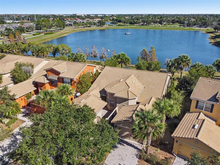 Welcome home to this beautifully appointed Cortina model, offering 2 bedrooms, 2 bathrooms, and a den/study with expansive water views, ideally located in the desirable Courtyards of Montelena —just minutes from Village Center amenities. Enter through a private front courtyard that sets the tone for relaxed Florida living. The open-concept great room features luxury vinyl plank flooring and stunning water views, seamlessly connecting to the spacious kitchen with an eat-at bar and sunny breakfast nook. Step outside to the screened and covered extended lanai and enjoy peaceful mornings and breathtaking sunrises overlooking the water. The primary bedroom suite boasts a tray ceiling and tranquil water views, complemented by an en-suite bathroom with a large walk-in shower. A guest bedroom and full bath are thoughtfully situated away from the primary suite, providing privacy for visitors. Additional features include a one-car garage with golf cart bay (GOLF CART INCLUDED),and EV hoo-up, newly painted interior, and a new refrigerator. HOA fees include exterior painting, landscaping, irrigation, cable, and internet, allowing for easy, low-maintenance living. This exceptional home combines comfort, convenience, and scenic beauty—schedule your private showing today! Solivita offers residents access to state of the art amenities and work out facilities, dance and aerobics studios, a business center, 14 heated swimming pools, 2 heated spas, tennis courts, pickleball courts, shuffleboard, bocce ball, billiards room, art gallery, 3 restaurants and 2 championship 18-hole golf courses, driving range and putting course. Every day offers something new to explore and enjoy! This home also features easy access to nearby shops,as well as a brand new shopping center that caters to all your needs (including Sprouts) dining, and health care, offering the perfect balance of privacy and lifestyle
