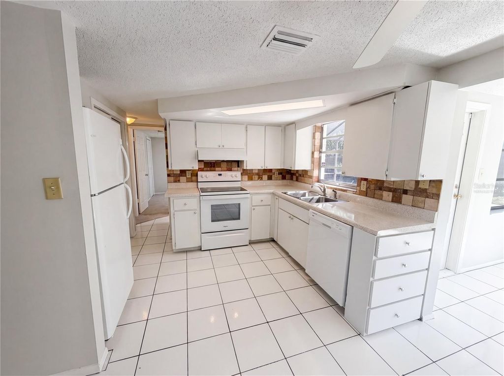 Photo of 9236 Mark Twain Lane, Port Richey, FL 34668 (MLS # O6406762)