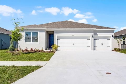 Photo of 5415 Cloudberry Avenue, Lakeland, FL 33811 (MLS # O6400806)