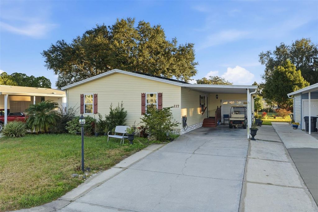 Photo of 117 Eola Park Drive, Davenport, FL 33897 (MLS # O6370365)