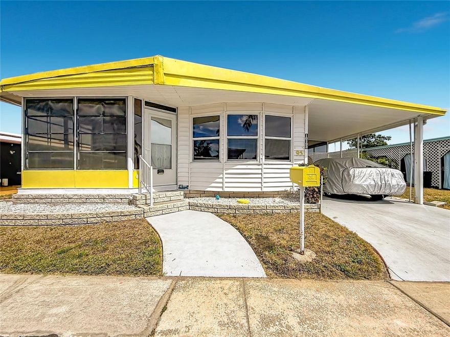 ADORABLE beachside cottage feel—light, bright, and full of charm! Located just 5 miles from the sugar-sand shores of Indian Rocks Beach and only a quick 10-minute drive to world-famous Clearwater Beach, this home offers the perfect blend of coastal living and everyday comfort.

Inside, you’ll find updated windows with professional tint and custom shades, allowing for abundant natural light while reducing glare and enhancing privacy. Stylish newer vinyl flooring flows throughout, complemented by a newer refrigerator and a brand-new hot water heater (2026).

Start your mornings in the sun-filled dining area, where ample windows offer a small view of the sparkling water perfect for enjoying your coffee. The main bathroom has been tastefully updated with a newer vanity and walk-in shower, while the primary bedroom features generous closet space and an updated ensuite half bath.

The exterior boasts durable vinyl siding and a private screened-in patio—ideal for relaxing during Florida’s beautiful winters. Furnishings are negotiable (with some exclusions), making this an easy move-in opportunity.

Located in the desirable Holiday Shores community, residents enjoy an active lifestyle with low HOA fees of just $200/month, covering water, sewer, twice-weekly trash service, and full lawn maintenance. Amenities include a putting green, shuffleboard courts, library, fitness center, and a full calendar of social events. Boating enthusiasts will appreciate the private boat ramp and first-come, first-served slips.

Conveniently situated about 30 minutes from Tampa International Airport and Clearwater/St. Pete Airport, this location offers easy access to everything the Gulf Coast has to offer. Please note: the community is currently undergoing sewer pipe upgrades at no cost to residents, with full restoration of the grounds upon completion.

Don’t miss your chance to own this bright and breezy coastal retreat!