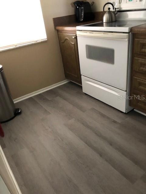 Photo of 333 Lake Howard Drive NW #302B, Winter Haven, FL 33880 (MLS # O6439240)