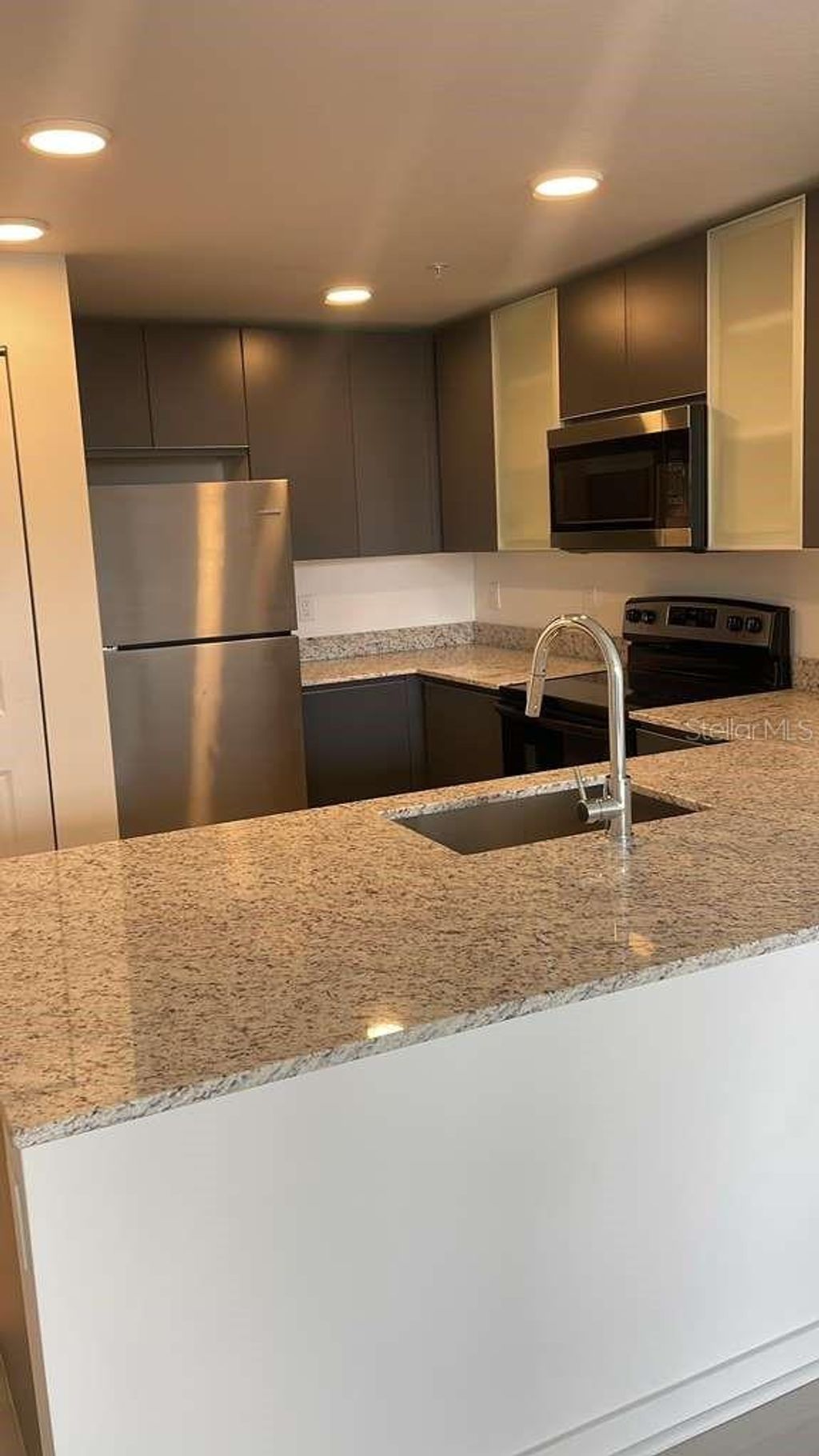 Photo of 5587 Millenia Park Boulevard #111, Orlando, FL 32839 (MLS # O6385173)