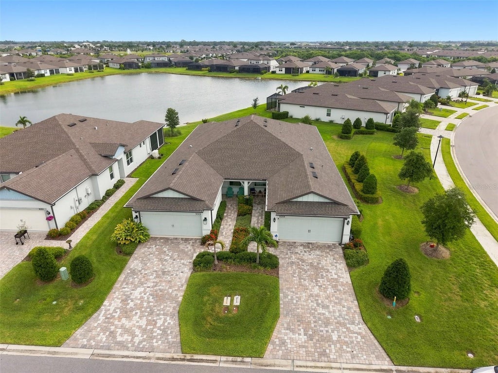 Photo of 10208 Coastal Shores Drive, Parrish, FL 34219 (MLS # TB8533407)