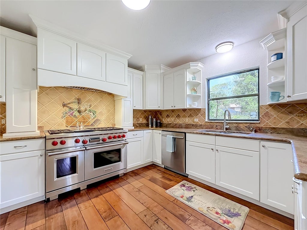 Photo of 12805 Twin Branch Acres Rd, Tampa, FL 33626 (MLS # TB8562328)