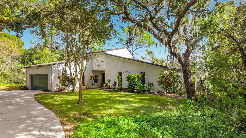 Photo of 12805 Twin Branch Acres Rd, Tampa, FL 33626 (MLS # TB8562328)