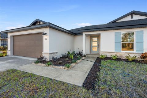 Photo of 50 Franciscan Lane, Palm Coast, FL 32137 (MLS # TB8408944)