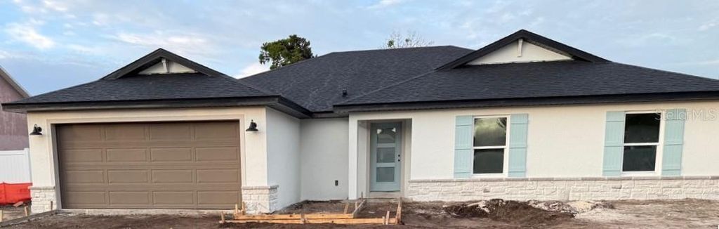 Photo of 50 Franciscan Lane, Palm Coast, FL 32137 (MLS # TB8408944)