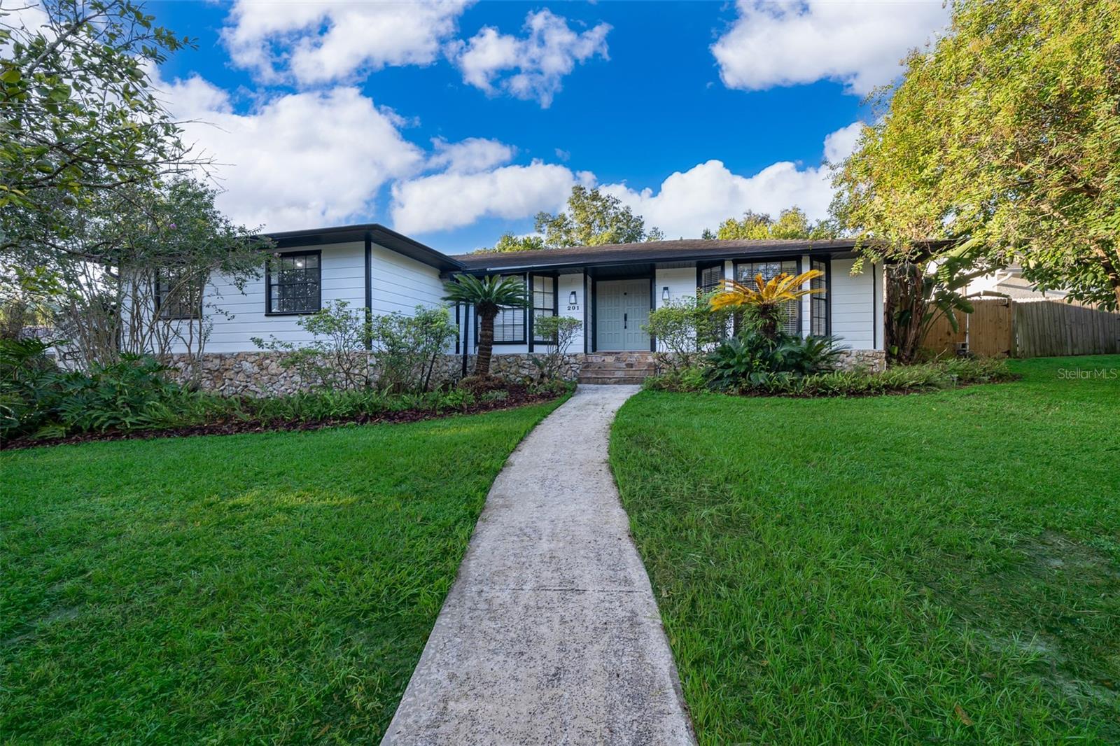 **LOW HOA** **COMPLETELY RENOVATED** Experience luxury living in this completely renovated 3-bedroom, 2-bath pool home, ideally situated on an oversized corner lot at the end of a quiet cul-de-sac in the sought-after community of Wekiva Hills. From the moment you enter, you’ll be impressed by the attention to detail, showcasing luxury vinyl plank floors, elegant lighting, and a split floor plan designed for both comfort and style.
The chef’s dream kitchen has been thoughtfully redesigned with designer finishes, featuring sleek cabinetry, quartz countertops, a custom backsplash, and premium appliances. Both bathrooms have also been fully renovated, offering a spa-inspired retreat with modern vanities, tile work, and high-end fixtures.
The floor plan includes a living room/office with French doors, a formal dining room, and a spacious family room highlighted by a stone fireplace. From here, step out to the shady screened porch overlooking your private resort-style pool and large backyard oasis—perfect for entertaining or serene evenings at home.
Living in Wekiva offers a lifestyle like no other, with access to tennis, pickleball, basketball, racquetball, fishing, baseball fields, walking trails, playgrounds, picnic areas, and the pristine natural beauty of Wekiva Springs State Park.
Best of all, the home is zoned for top-rated schools, making this the perfect balance of elegance, convenience, and family-friendly living.