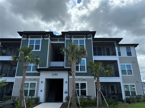 Photo of 2280 Waterfall Court #4-302, Mount Dora, FL 32757 (MLS # O6412545)