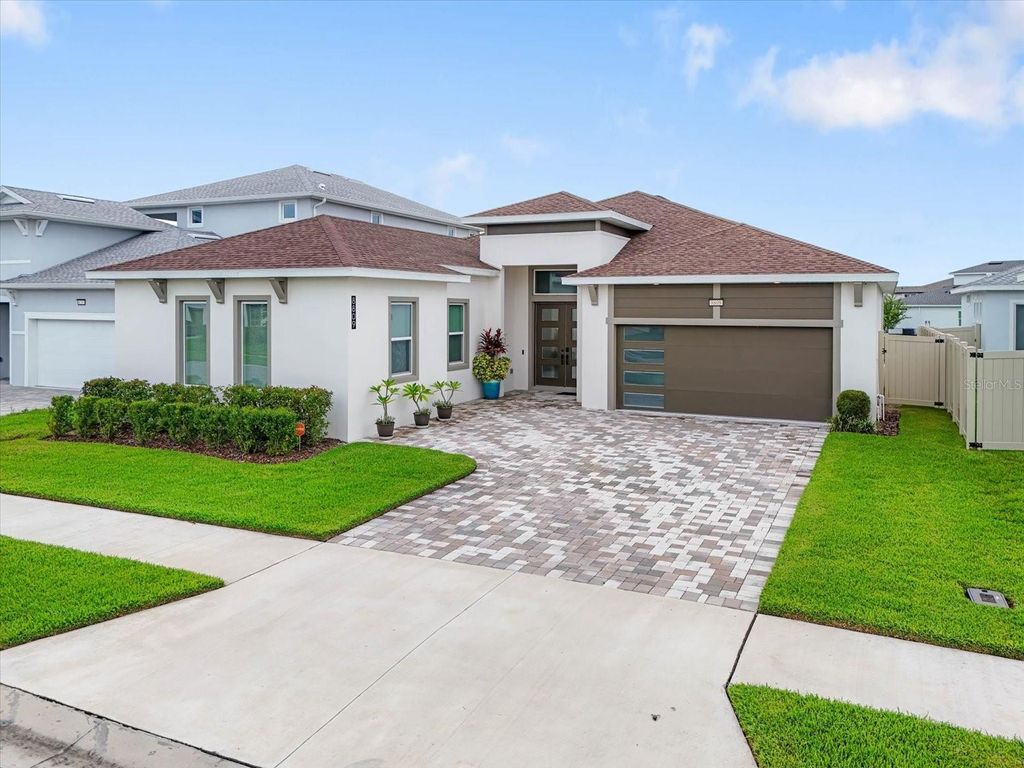 Photo of 8809 Drummer Plank Drive, Wesley Chapel, FL 33545 (MLS # TB8492931)