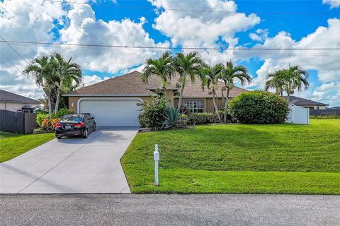 Photo of 334 NE 17th Street, Cape Coral, FL 33909 (MLS # C7515559)