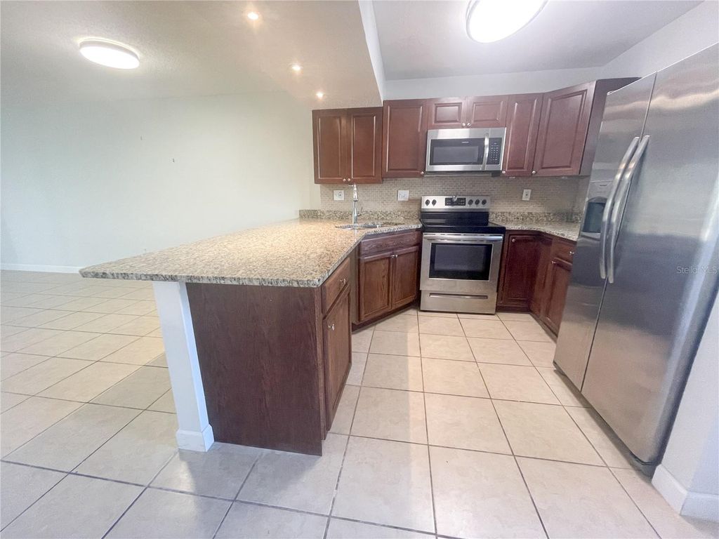 Photo of 2625 State Road 590 #1211, Clearwater, FL 33759 (MLS # TB8484673)