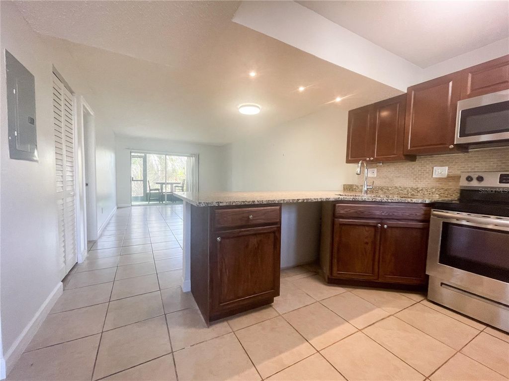 Photo of 2625 State Road 590 #1211, Clearwater, FL 33759 (MLS # TB8484673)