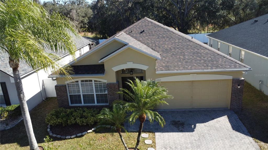 Photo of 1707 Lalique Lane, Orlando, FL 32828 (MLS # O6372899)