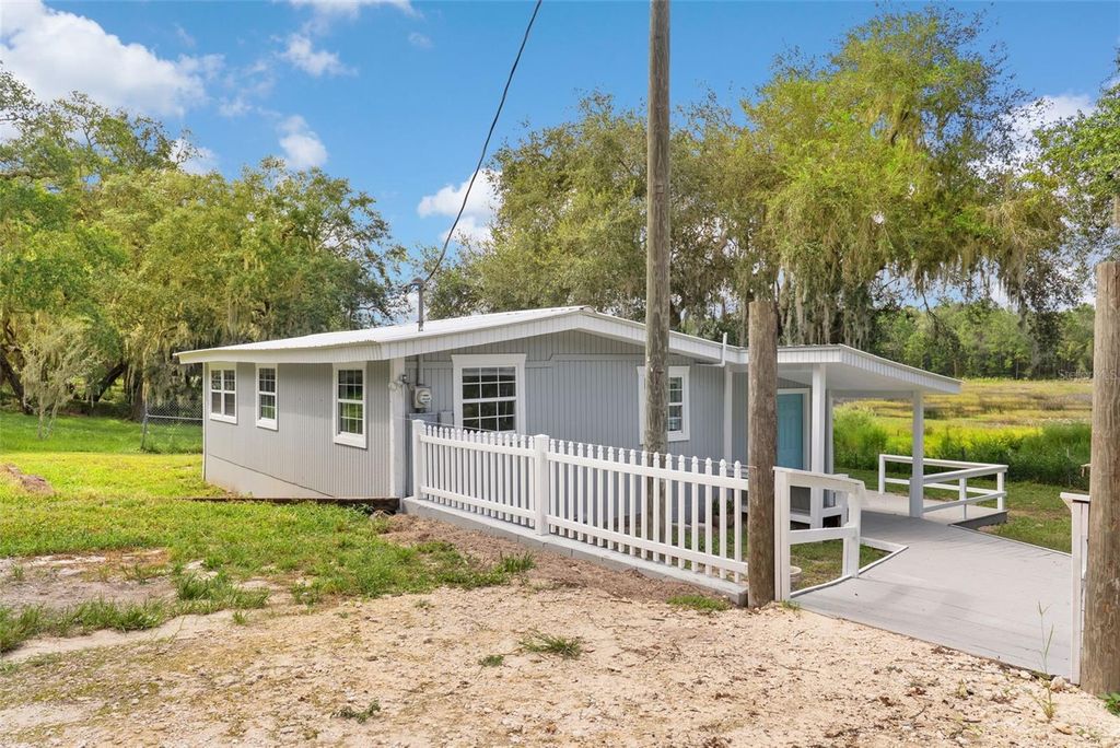 Photo of 15375 SE 64th Place, Ocklawaha, FL 32179 (MLS # O6351240)