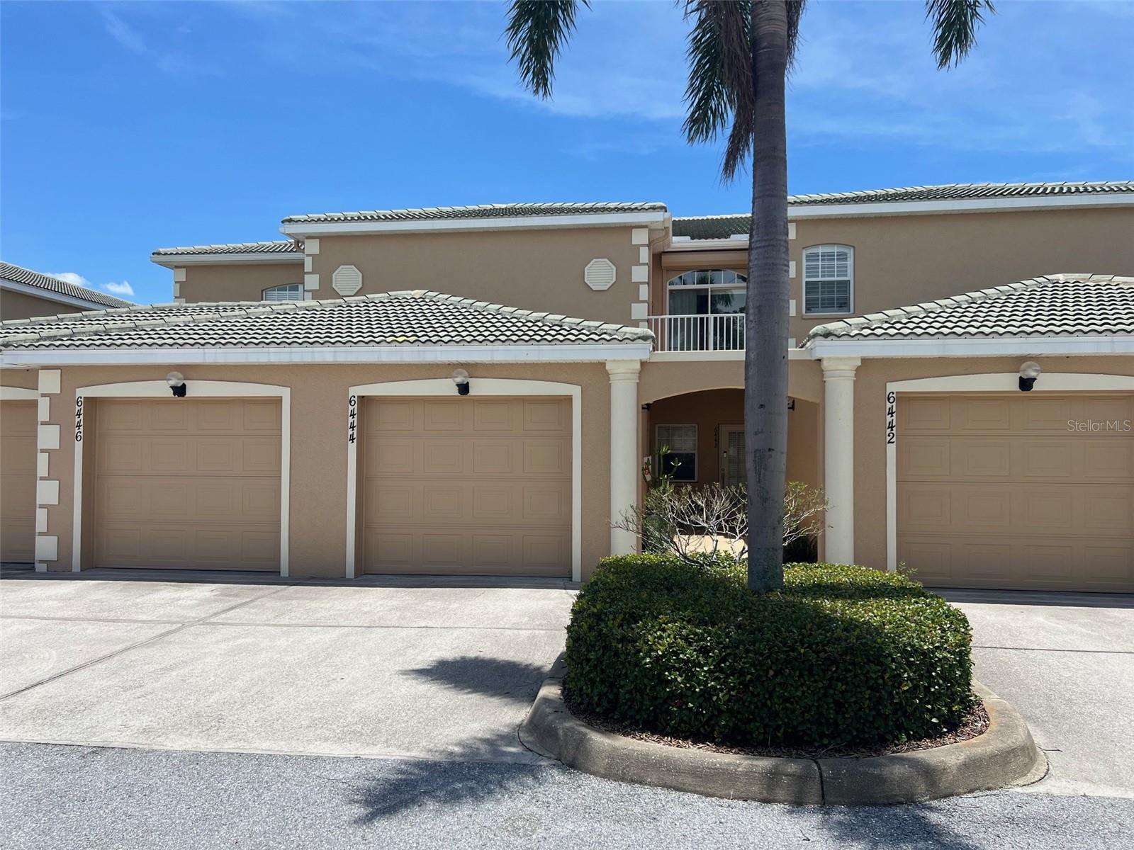 West Bradenton condo with a view! This unit enjoys superior, 2nd floor elevated views from the lanai of the lake, fountain and walking trail. From the entry use the stairs to or the stair lift to your open and bright condo. The open kitchen has tons of storage and is just steps from the living room and dining spaces for ease of entertaining. Take a short walk to the clubhouse for a swim or a soak in the hot tub, or maybe just stroll around the lake on the paved path. This 3 bedroom 2 bath condominium has its own private attached garage and a driveway for a second car. Some furnishing have been sold but some remain for sale. Please ask for a list if interested. Washer and dryer are included in the unit. This unit has hurricane rated shades on the lanai and a robust roll up hurricane shutter for the sliding glass door to the front balcony. In addition there is a generator hook-up on the front balcony for your convenience. The Hidden Lake Condo complex has only two story buildings so no mandatory state mandated inspections which could result in expensive assessments apply. Seller will remove chair lift if opted by buyer prior to closing. What's not to like?