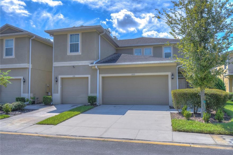 MOVE-IN READY! GREAT LOCATION! Beautiful 3 bedroom/2.5 bath/LOFT/2 car garage townhome built in 2016 located in the desirable community of Broadway Centre Townhomes! As you enter into the townhome you are greeted with an abundance of NATURAL LIGHT, high ceilings, and wood like TILE FLOORING (2016) throughout the first floor. The kitchen has been updated with SHAKER STYLE cabinetry with crown moulding (2021), GRANITE Countertops (2021), NEW Dishwasher (2021), NEW Microwave (2021), and overlooks the living/dining room area. Master bedroom is conveniently located on the first floor. Master bathroom includes a DOUBLE vanity with Granite Countertops, Walk-In Shower, GARDEN TUB, and a WALK-IN CLOSET and Secondary Closet. Upstairs includes a LOFT or BONUS AREA, secondary bedrooms, and a guest bathroom. Other features and improvements include: First Floor Inside Laundry Room, First Floor Interior Painted (2021), Second Floor Interior Painted (2022), NEW CARPET UPSTAIRS (2022), Washer/Dryer Convey, LOW HOA of $211/month, NO CDD FEE, and Community Pool. Easy access to shopping, restaurants, Tampa International Airport, downtown business district, USF, area hospitals and parks. *Building Exterior is currently scheduled to be painted at the end of 10/23 by HOA.