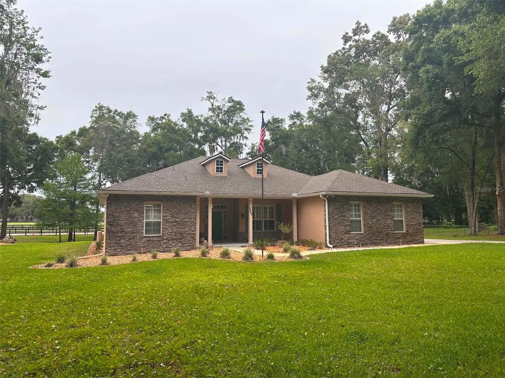 Photo of 1989 NW 111th Loop, Ocala, FL 34475 (MLS # OM725303)