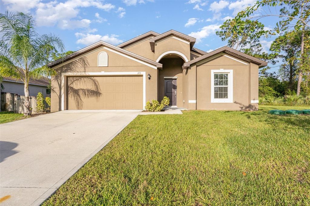 Photo of 1973 Jupiter Boulevard SW, Palm Bay, FL 32908 (MLS # O6349545)