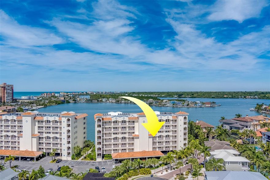 Welcome to luxury living at its finest in the prestigious gated community of Redington Shores Yacht and Tennis Club. This stunning 3-bedroom, 3.5-bathroom condo offers over 3000 square feet of meticulously designed living space, ensuring comfort and elegance at every turn. Step into a fully furnished sanctuary where every detail has been thoughtfully curated, allowing you to simply unpack your bags and start enjoying resort-style living. Available from July 2025 through December 2025, this exquisite condo promises an extended vacation experience. The true split bedroom plan ensures privacy and tranquility, with an expansive master suite boasting a walk-in closet and ensuite bathroom overlooking the breathtaking blue waters of the bay. Relaxation awaits on the 45-foot covered balcony, where you can savor panoramic views and watch dolphins play. Entertain with ease in the spacious, open-concept kitchen and living areas, complete with a chef's delight kitchen featuring built-in convection oven, granite countertops, and stainless steel appliances. A generously sized furnished den offers the perfect retreat for unwinding with a book or enjoying a movie night. Redington Shores Yacht and Tennis Club provides residents with exclusive access to a wealth of amenities, including a clubhouse with fitness center, pickleball and tennis courts, and a clubhouse pool. Additionally, the building boasts a designated heated pool and hot tub overlooking the picturesque harbor, as well as a grilling area for enjoying poolside meals. 2 designated COVERED PARKING SPACES!! With the Gulf waters just a short walk away, you'll have easy access to pristine beaches, while restaurants, shopping, and vibrant beach life are all within close proximity. This condo truly embodies the feeling of home in a resort-like setting. Don't miss out on the opportunity to experience luxury living at its finest – schedule your appointment today.