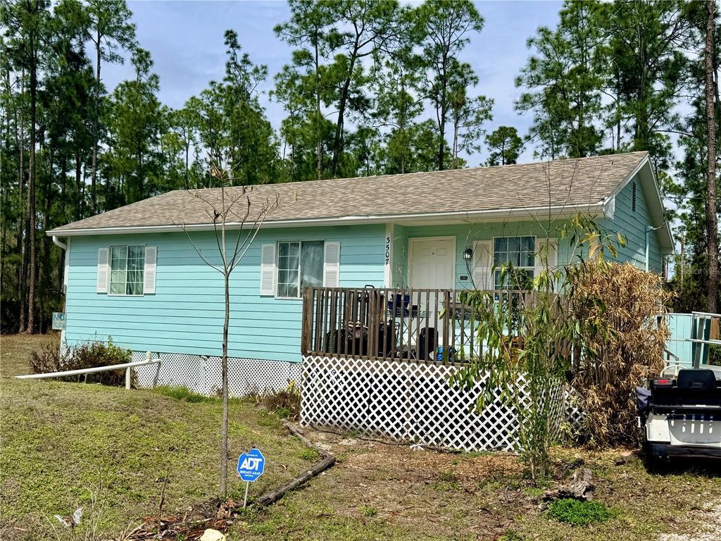 Photo of 3507 E 9th Street, Lehigh Acres, FL 33972 (MLS # C7523653)