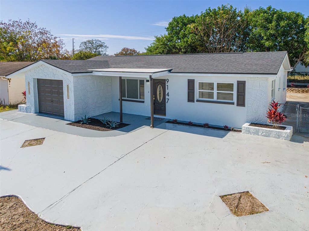 Photo of 9147 Richwood Lane, Port Richey, FL 34668 (MLS # W7881643)