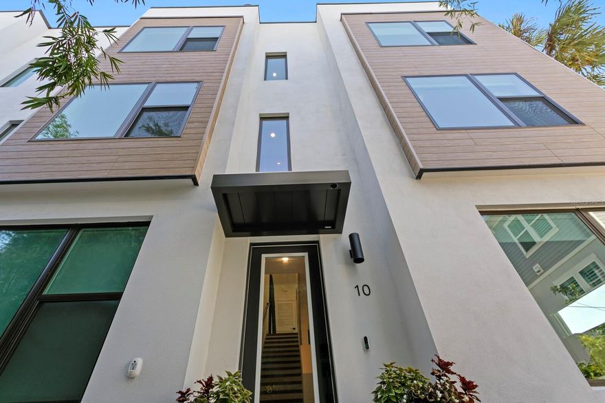 Luxury Modern Living in South Tampa! Located near popular SoHo and Hyde Park, this newly built 3 bedroom 3.5 bath townhome boasts an ultra-spacious, open floor plan. This stylishly designed modern townhome has a prime location with upgrades galore! Live the South Tampa lifestyle with elevated finishes including: custom closets, upgraded appliance package, quartz countertops, wide plank flooring, and a fabulous rooftop patio to enjoy the sunsets. Recently completed in 2024 by Onyx + East Builders, this boutique community has a low HOA and is pet friendly. Tucked into the quiet back corner, this residence is well-situated with lots of natural light, offering quiet enjoyment and privacy. It also has a convenient location in South Tampa close to iconic Bayshore Boulevard, Hyde Park Village shopping and dining, popular eateries along Howard Avenue, Tampa International Airport, and downtown Tampa. This residence shows beautifully and will not last long, so come check it out today!