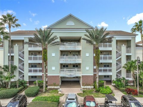 Photo of 7660 Whisper Way #402, Reunion, FL 34747 (MLS # O6373017)