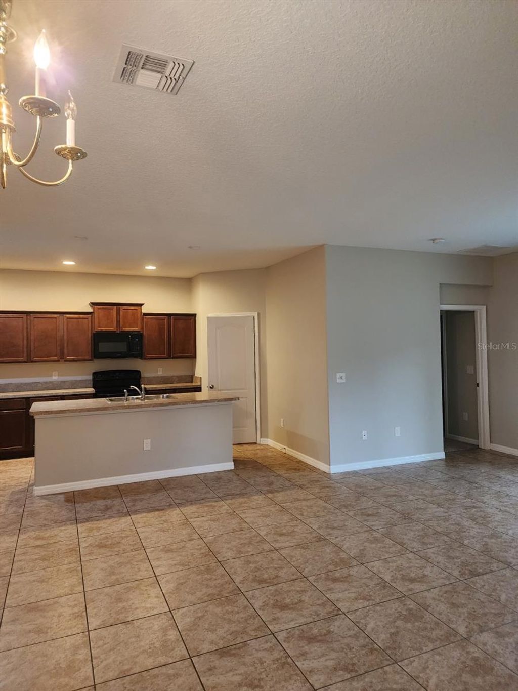 Photo of 2765 Carrickton Circle, Orlando, FL 32824 (MLS # O6409680)