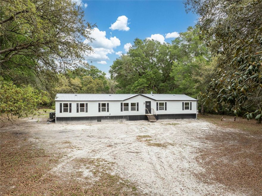 NEWLY REMODELED! NEW ROOF! NEW KITCHEN CABINETS! Fully remodeled 4-bedroom, 2-bath mobile home on a well-maintained lot in Dunnellon, FL with a brand-new metal roof, new kitchen cabinets, new counter tops, and luxury vinyl plank flooring through out the house.  Sitting on a generous lot over an acre it is ready to be turned into your own mini farm! The property is located not far from Ross Prairie Wildlife Management Area so get ready to go out and hike in the natural Florida hardwoods with the occasional deer and turkey coming through your yard.  Not too far away is I75 for easy access to Ocala and all the luxuries and attractions that it holds. If you're looking for your own quiet piece of Florida to relax and enjoy yourself with friends and family don't wait, call me today!!