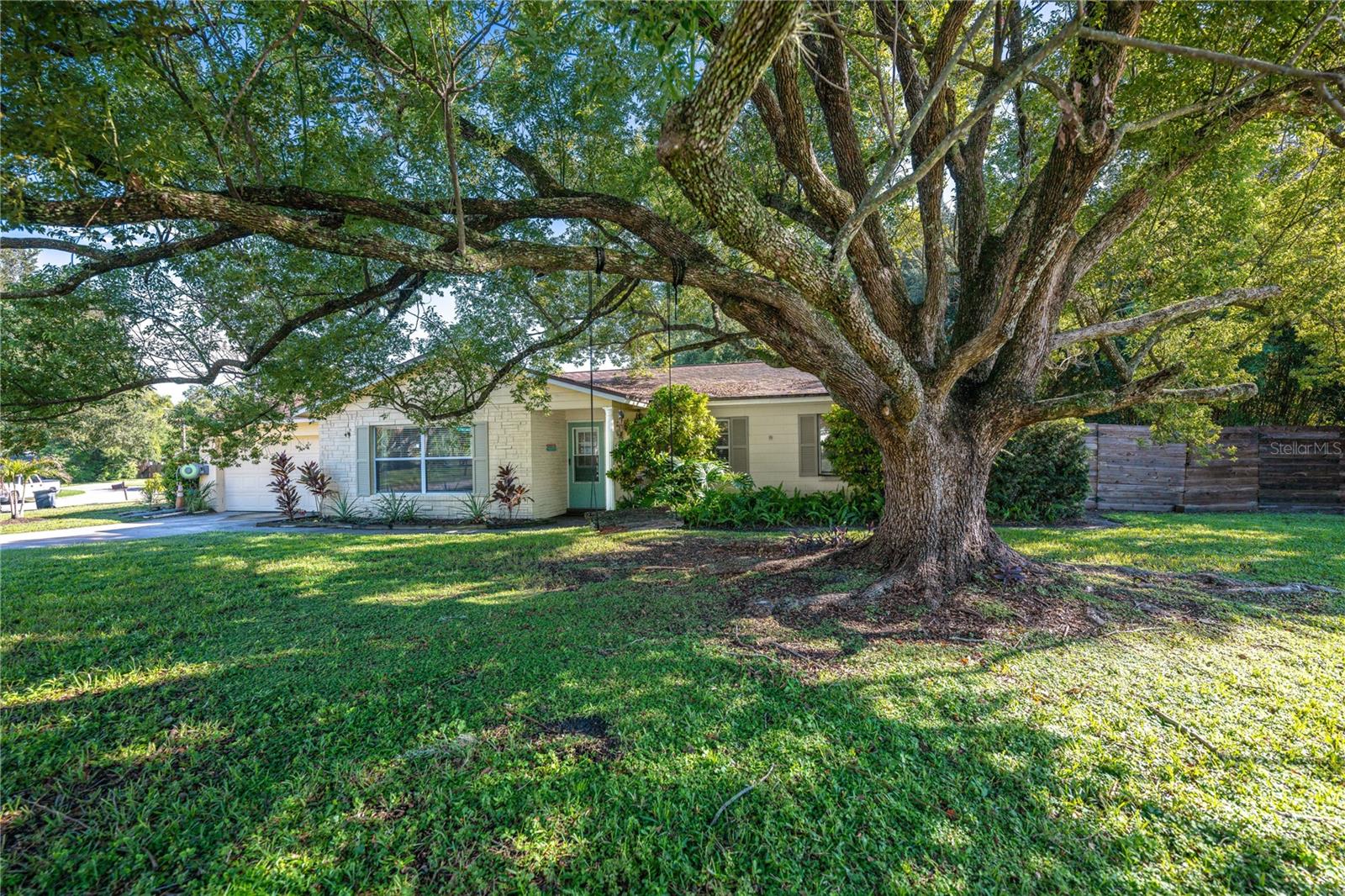 This is a light and bright home with an open floor plan. The interior features an eat-in kitchen with a water filtration system, gas range ,crown molding, and stone counters. The flooring is a mix of ceramic tile and laminate, and the home has central heating and cooling. The backyard is a serene oasis, featuring low-maintenance artificial turf and a dedicated hot tub area—perfect for relaxing evenings and effortless outdoor entertaining.A large lanai provides a space for outdoor fun, and there is also an expanded "flex room" that can be used for crafts, projects, or storage. The utilities are connected to a public water and public sewer system. Recent updates include the kitchen, baths, and living space. The property's owners expanded the living area by enlarging the laundry room into the flex room. The home is conveniently located near the Casselberry Greenway Trail, shopping, and restaurants.