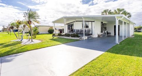 Photo of 1520 Blue Heron Drive, Englewood, FL 34224 (MLS # C7500560)