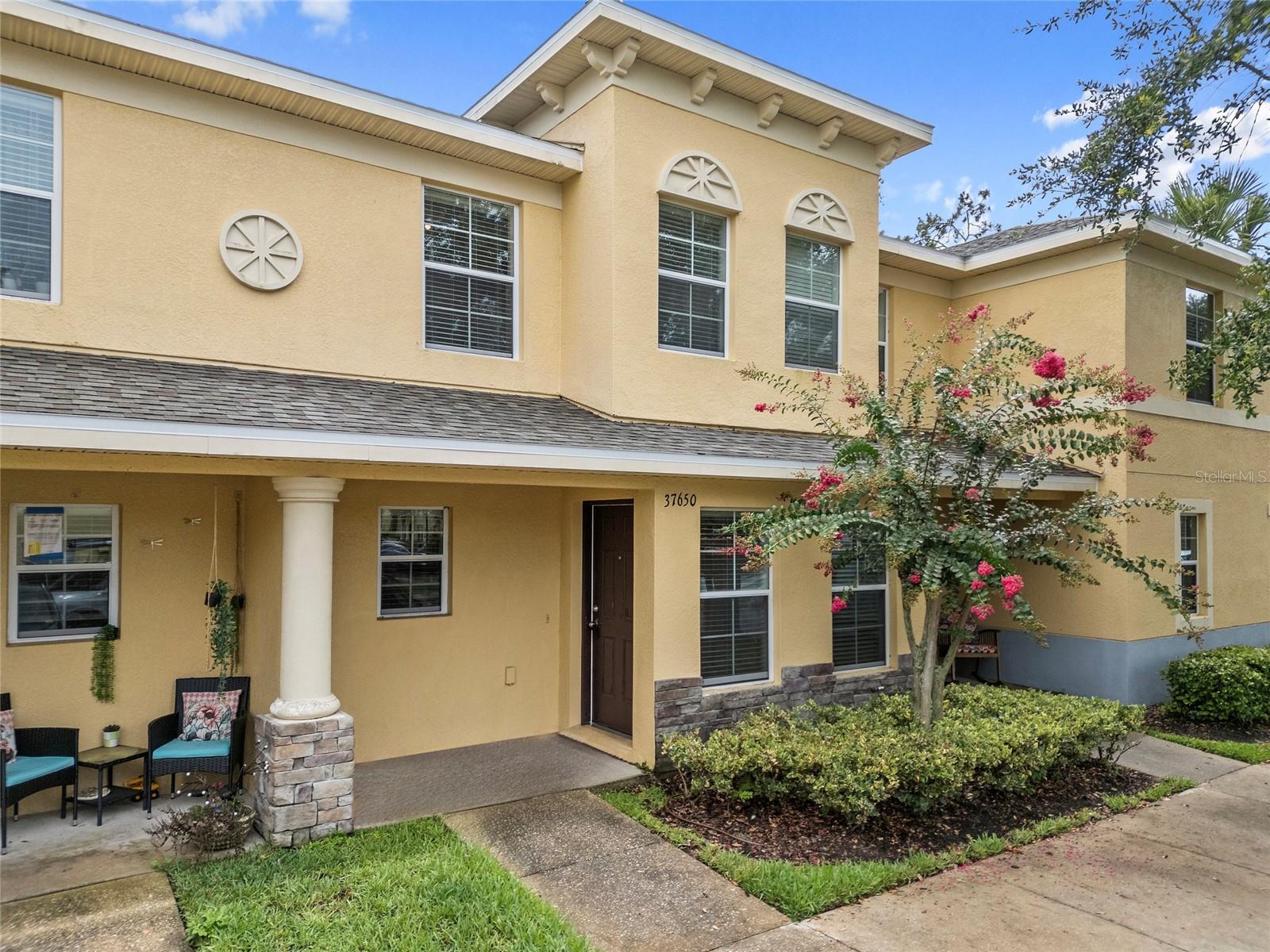 Welcome home to this charming 2 -bedroom, 2.5-bath townhome with a bonus room offering 1,561 square feet of comfortable living space and a flexible floorplan to suit your needs. Whether you're a first-time buyer, a growing family, or looking to downsize without compromise, this home is a great match. The bright and functional kitchen is outfitted with granite countertops, stainless steel appliances, and a breakfast bar that's great for quick meals or casual gatherings. The open dining and living areas make everyday living and entertaining a breeze. Upstairs you'll find two generously sized bedrooms with brand new carpet, placed in a split plan for added privacy, each with its own bathroom for ultimate convenience. Need a little extra space? There is a bonus room that is perfect for a third bedroom, home office, playroom, or creative space—whatever fits your lifestyle. Step outside to a private screened lanai where you can relax in the evenings, plus enjoy an attached storage room to help keep things organized. This townhouse is a MUST SEE!! Ideally located near shopping, dining, healthcare, and entertainment, it offers easy access to everything you need.