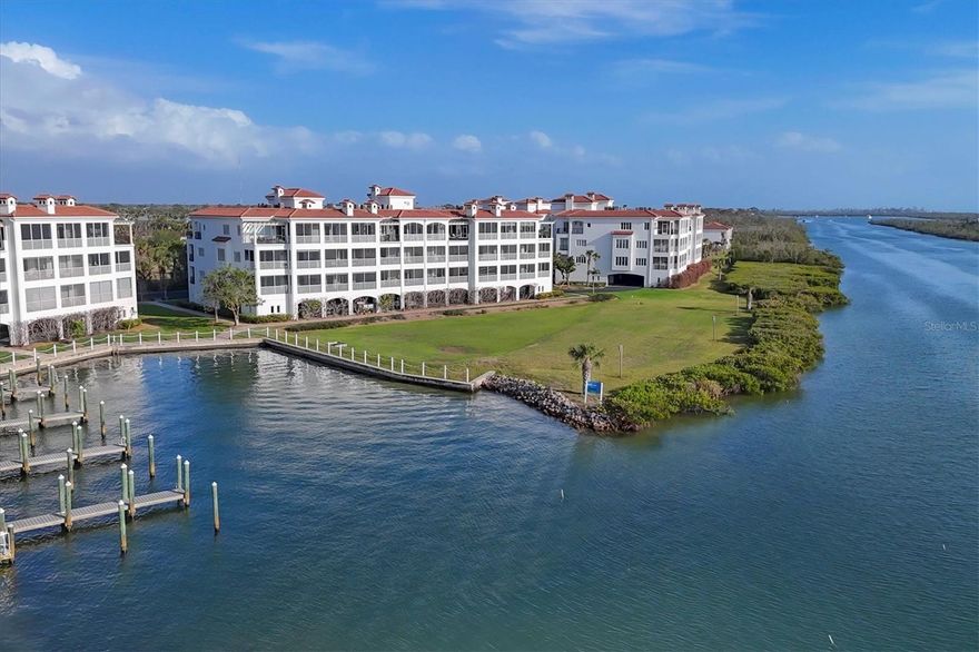 This exceptional corner property, located on the third floor, offers a luxurious living experience with breathtaking views of the Intracoastal Waterway. Designed by a professional interior designer during its original construction, the home spans nearly 2,000 sq.ft. under air, featuring 3 bedrooms, 2.5 baths, a large 400 sq.ft. screened lanai, and a charming terrace accessible from both guest bedrooms. With a southern and western exposure, the residence is bathed in natural light from the dozens of impact-resistant Andersen casement windows and glass sliders that showcase panoramic water views. Inside, the home boasts soaring 10-foot ceilings, 8-foot solid core doors, and an expansive open-concept dining and living room area that seamlessly flows into the kitchen. The fully integrated design enhances the open feeling, allowing views and light to pour throughout the space. The kitchen is equipped with top-tier features, including custom Italian LUBE cabinetry, level 5 stone countertops, high-end appliances such as a Bosch dishwasher, newer KitchenAid refrigerator, and electric roll-down storm shutters on the lanai. Additional luxury elements include crown molding, 18" tile floors, custom plantation shutters, and sophisticated drapery throughout. The spacious primary suite is a serene retreat, featuring a large bedroom, walk-in closet, and a luxurious bath with a custom-built linen chest and stunning lake rock stone countertops. The unit is also equipped with a high-end fitness center and exclusive amenities such as two resort-style pools, a spa, a waterfront clubhouse, a fenced dog park, fishing pier, day dockage, pickleball and tennis courts, and beautifully landscaped grounds spanning 23 acres with paver sidewalks. Residents enjoy close proximity to a full-service marina, excellent shopping and dining options, historic Boca Grande, pristine beaches, golf courses, and immediate access to world-class fishing and boating. A truly unparalleled opportunity for luxury living in a vibrant, tropical setting.
