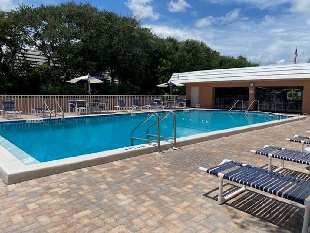Photo of 4150 S Atlantic Avenue #121B, New Smyrna Beach, FL 32169 (MLS # O6400320)