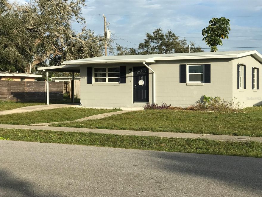 NOTE: Tenants are still living there through the end of the month. Adorable, cozy  2 bedroom home with carport attached.   Newer painted walls and tile flooring throughout. New mini split air conditioner added, also water purifying/softening system.  Fenced back yard which includes shed.   Laundry room with washer and dryer included.  Roof is 2-3 years new.  Priced comparable to condo or apartments.  Enjoy the freedom of living in your own home without neighbors above or below you.  Excellent central location near shopping, medical, hospitals, restaurants, school, movies and entertainment, located near a small park a few blocks away.. Also near major highways..  Lawn maintenance is tenants responsibility.  Pet friendly however Landlord reserves the right to accect or reject pets at his on a case by case basis.    Non refundable deposit will apply