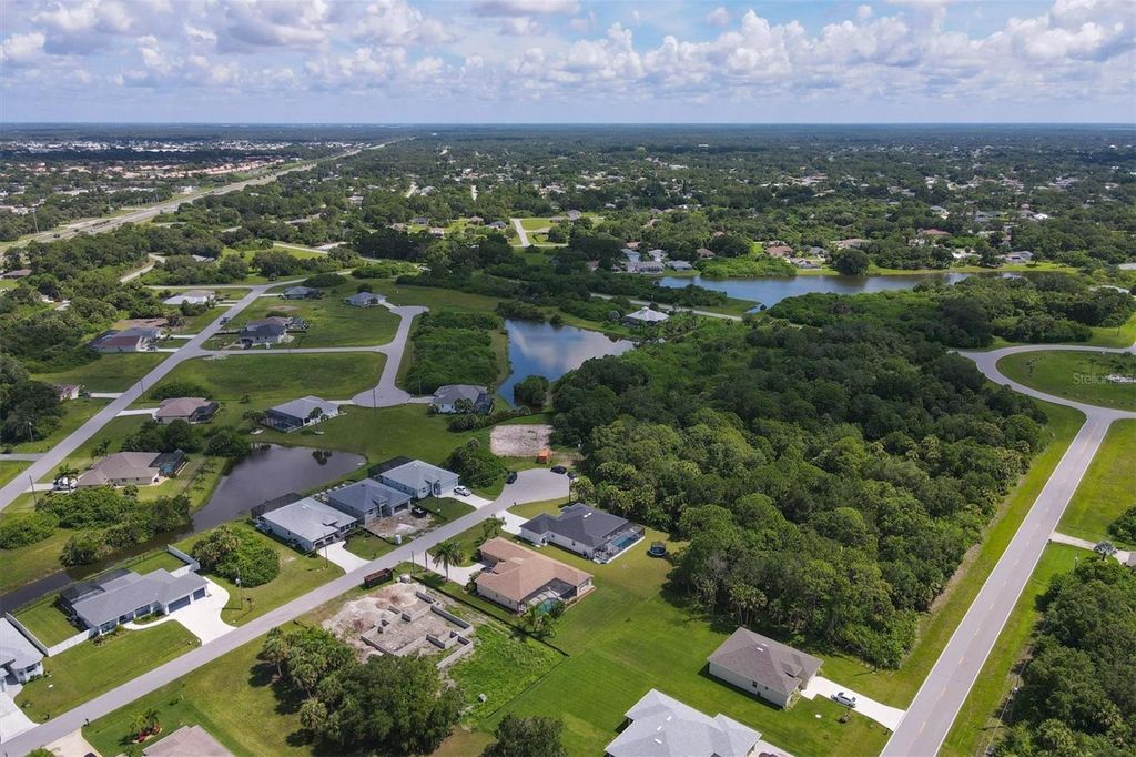 Photo of 132 Hunter Road, Rotonda West, FL 33947 (MLS # N6142705)