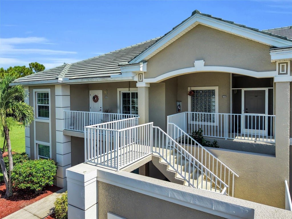 Photo of 2280 Somerset Ridge Drive #201, Lehigh Acres, FL 33973 (MLS # C7532086)